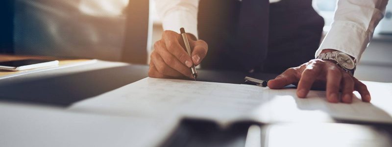 Corprorate-Man-signing-papers Meeting to appoint epa provider